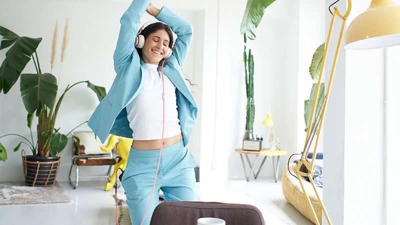 successful businesswoman dances office attire happily celebrating work female office worker